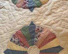 15 quality quilts in different patterns