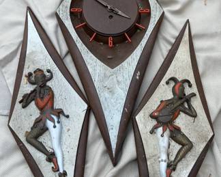 Mid-century modern Burwood clock and harlequin wall plaques.