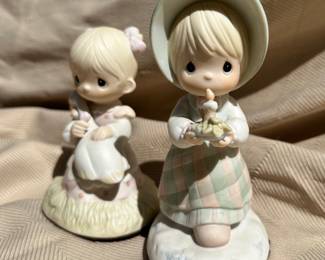 Jonathan David and Precious Moments figurines.
