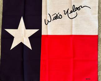 Willie Nelson signed Texas flag.