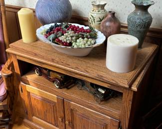 Vases, candles, oak cabinet