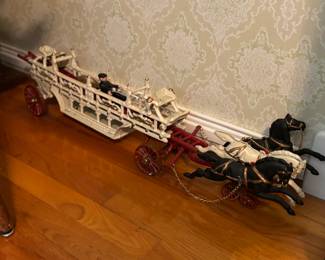 Antique cast iron fire hook and ladder horse drawn truck