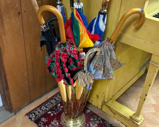 Vintage umbrella stand and umbrellas 