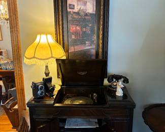 Antique victrola converted into a stereo unit with turntable