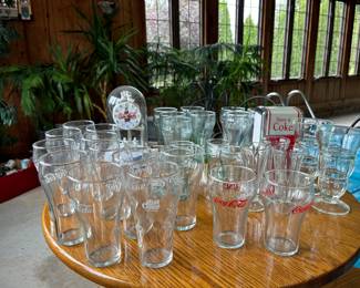 Coca Cola glassware, napkin holders, anniversary clock