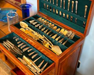 Beautiful rosewood 4 drawer silverware / linen storage that is absolutely full!