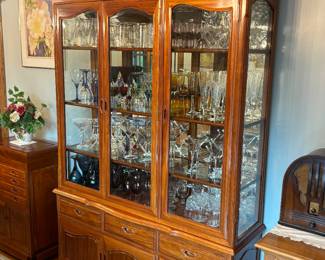 Stunning rosewood display / china cabinet with storage, antique radios, antique banks