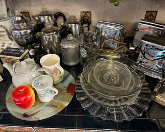 Antique toasters, percolators, juicer, teapot