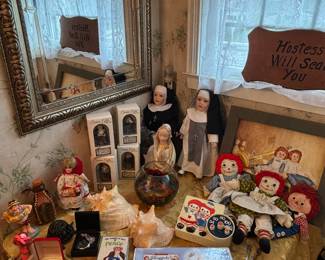 Raggedy Ann collectibles, religious figurines, pocket watches