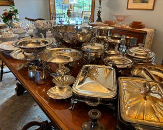Large selection of silver serving pieces 