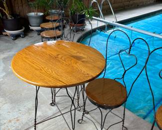 Multiple cute tables and chairs