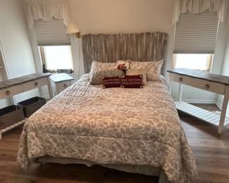 Queen size bed with mattresses and stands shown.