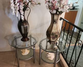 Two round glass top end tables
