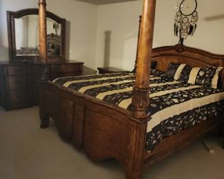 Beautiful 4 post King Size Bedroom Set includes Dresser with mirror, 2 Nightstands and entire bed and bedding
