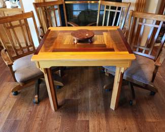 Hand crafted Unique table with 4 rolling chairs