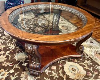 Round coffee table with glass insert