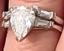 Ladies platinum 2.58 carot diamond wedding set. 8.1 grams platinum. Appraised at $14,875.00 in June 2024 by Fountain City Jewelers.