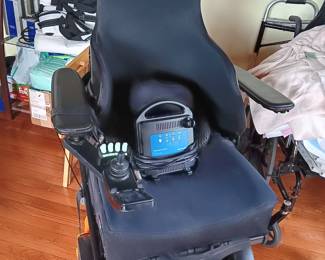 Permobil electric wheelchair with battery, originally purchased for $42,000