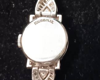 Ladies Hamilton Watch contains 22 grams of platinum movement included. 68 white round diamnonds. Appraised at $4327.65 in June 2024 by Fountain City Jewelers