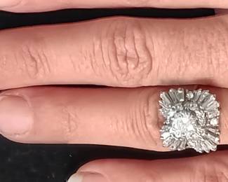 Ladies vintage diamond ballerina ring. 7.3 grams of 14 kt white gold with natural white round 3/4 CT diamond surrounded by 16 natural white round diamonds. Appraised at $3875.00 in June of 2024 by Fountain City Jewelers.