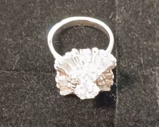 Ladies vintage diamond ballerina ring. 7.3 grams of 14 kt white gold with natural white round 3/4 CT diamond surrounded by 16 natural white round diamonds. Appraised at $3875.00 in June of 2024 by Fountain City Jewelers.