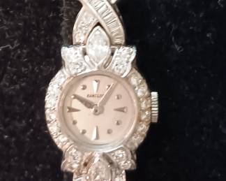 Ladies Hamilton Watch contains 22 grams of platinum movement included. 68 white round diamnonds. Appraised at $4327.65 in June 2024 by Fountain City Jewelers