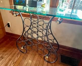 Metal wine rack with glass top