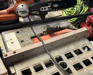 Black & Decker chainsaw and table saw