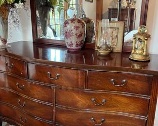 Antique bow front dresser with mirror