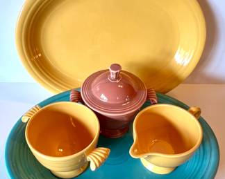 Fiesta platters, sugar bowls and creamer