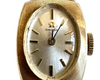 Vintage 14 Carat Gold Omega Watch With Champion Band
Lot #: 14