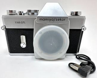 Vintage Mamiya Sekor 1000 DTL SLR 35MM Camera, In Working Order
Lot #: 59