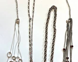 4 Vintage Silver Tone Necklaces
Lot #: 152