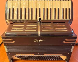 Vintage Lyric Accordion With Mother-of-Pearl Keys
Lot #: 10