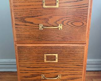 Wooden Filing Cabinet On Casters
Lot #: 202