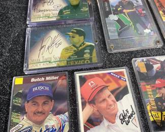 Many autographed racing cards