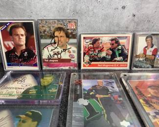 Many autographed racing cards
