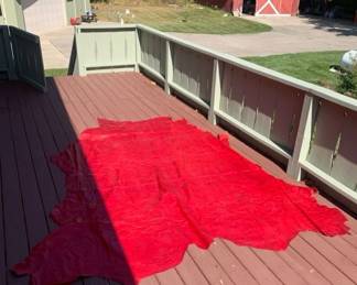 One of several large pieces of brand new high quality leather upholstery. Beautiful Rich Red Color
