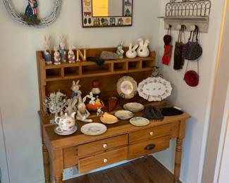 An assortment of Eddie Walker (Midwest Cannon Falls) Easter Decor items on an antique dresser