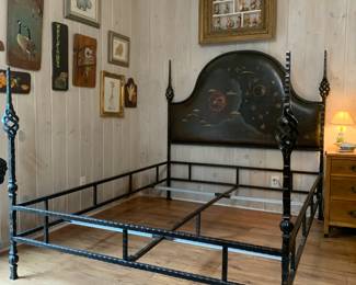 "Architectural motifs such as gates and fencing are apparent in its arched headboard, railings, and posts with open twist finials."