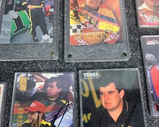 Many autographed racing cards