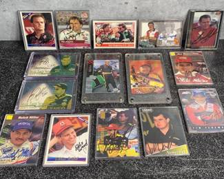 Many autographed racing cards