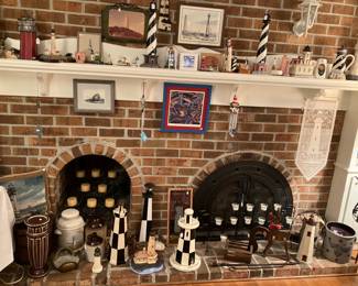 Large lighthouse collection to include artwork throughout the room, not seen in photo 