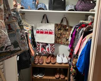One of six closets, full of ladies, clothing, and handbags. Sizes medium to extra large. 5 of the closets  clothing priced $4-$10 with the exception of the  semi formal/formal closet.