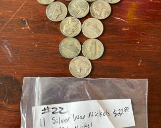 #22	11 silver war nickels and 1 buffalo nicker	 $22.50 
