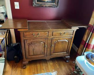 #48	Ethan Allen Oak Buffet w/flip-open Sides w/2 drawers & 2 doors w/1 shelf - 42-59x19x36	 $125.00 
