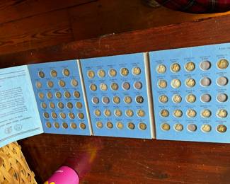 #14	67 Mercury dimes in album silver 	 $190.00 
