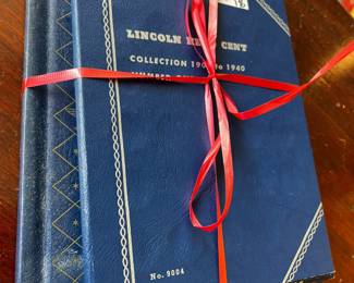 #18  1909-1940 wheat pennis (4 albums) #1( 28 )#2 (24)  #3&4 of 1941 on  24 #4 (67)	 $35.00 			
