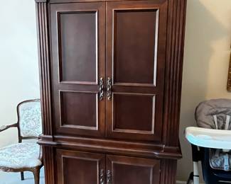 #98	Hooker Entr. Cabinet (1 piece) w/4 doors (top w slide back) and 3 drawers & 3 shelves (1 pull-out) - 45x21x81	 $125.00 
