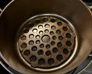 #165	Griswold No 9 Dutch Oven - 3 pc - Pot, top & Trivet - Seasoned in Good Shape	 $200.00 
